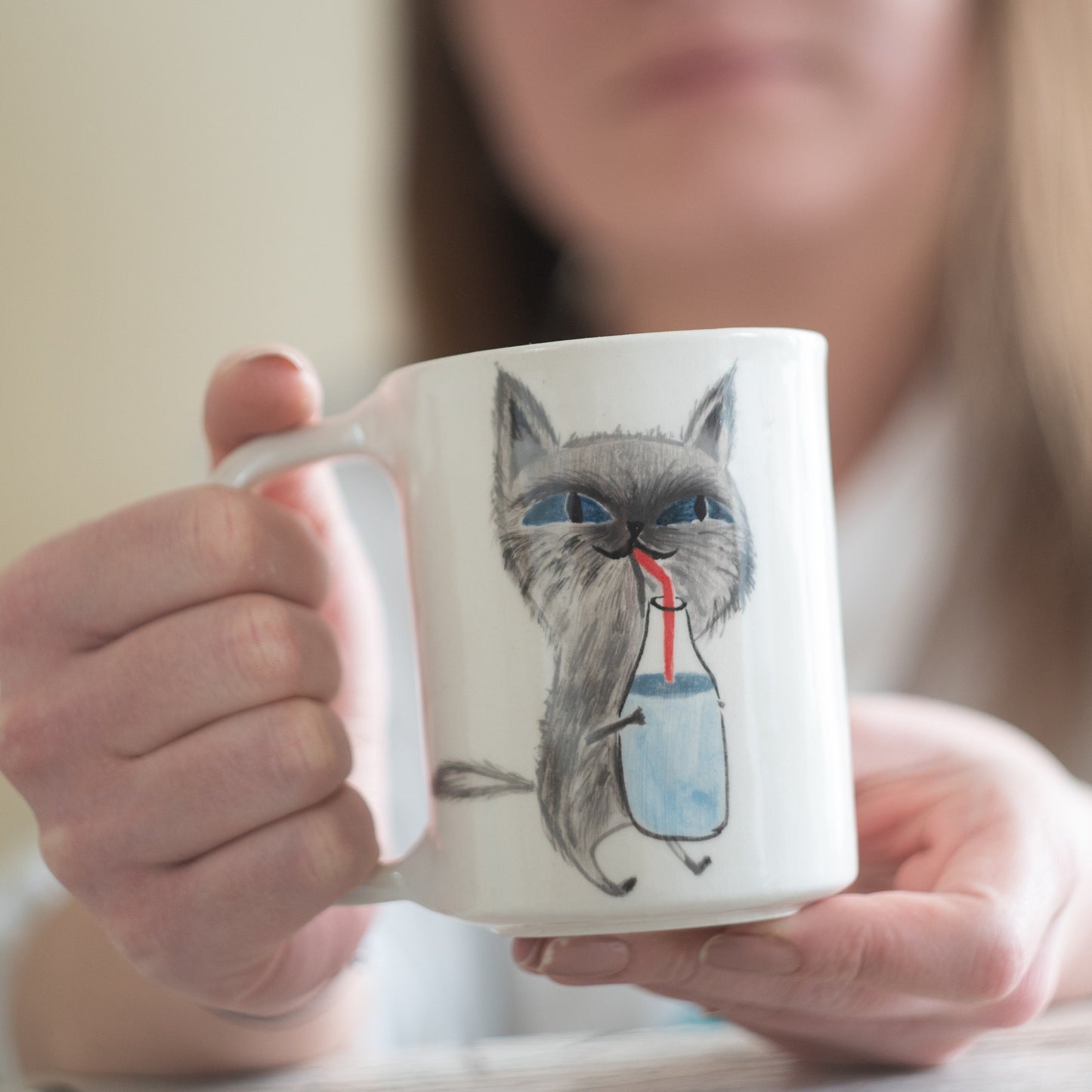 cat drinking milk