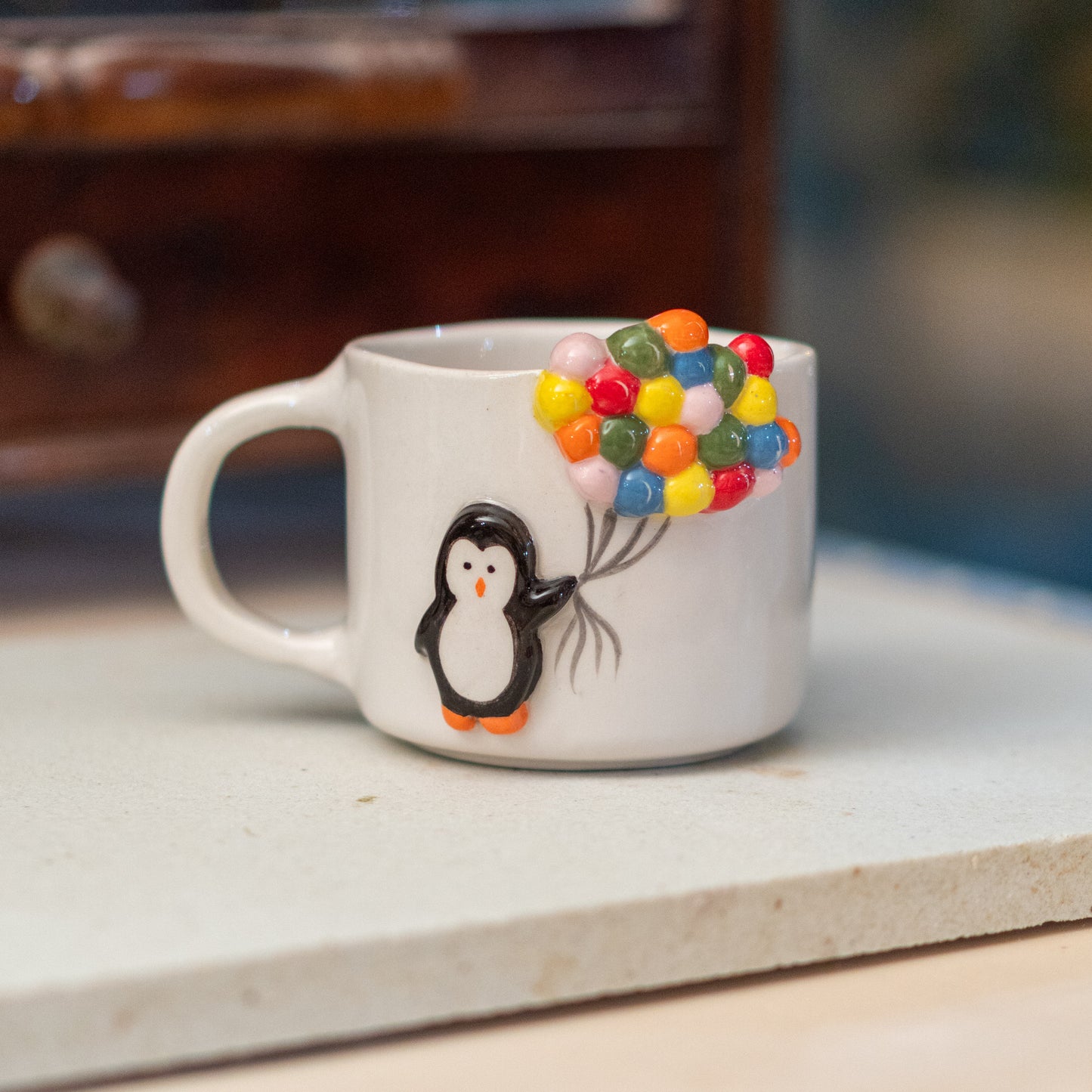Close-up of Cute Penguin Design on Handcrafted Mug – A Personal Touch to Your Coffee Ritual