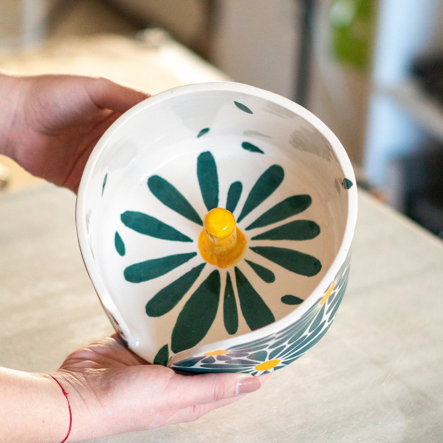 Elegant floral kitchen decor, demonstrating the paper towel holder’s versatility and aesthetic appeal in a home setting