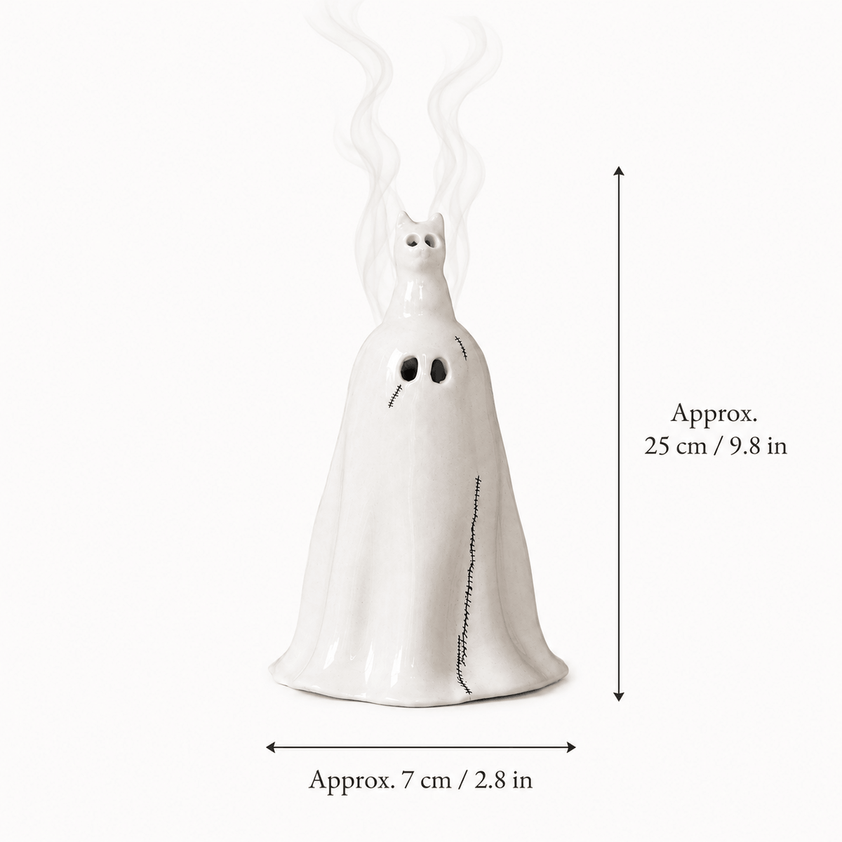 Size guide for the ghost cat incense holder: white ceramic ghost-shaped incense burner with black facial features and a stitched mouth, with dimension arrows showing approximately 25 cm in height and 7 cm in width.