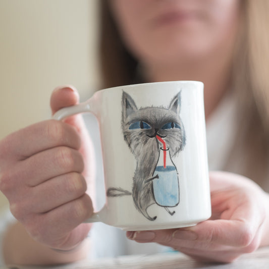 cat drinking milk