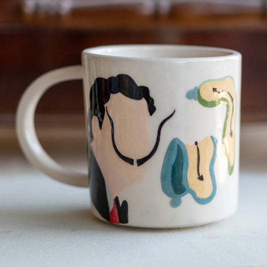 Surrealist Mug
Dali-Inspired
Artistic Coffee Cup
Handmade Ceramic Mug
Abstract Art Mug
Unique Drinkware
Modern Kitchen Accessory
Hand-Painted Mug
Artistic Gift
Eco-Friendly Mug